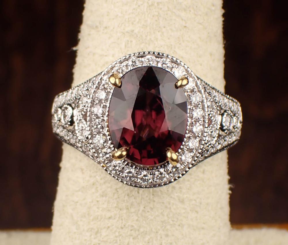 Appraisal: RHODOLITE GARNET DIAMOND AND FOURTEEN KARAT GOLD RING The k