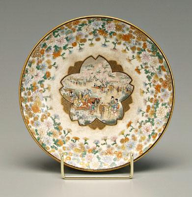 Appraisal: Satsuma plate figures viewing cherry blossoms within flower-shaped cartouche border