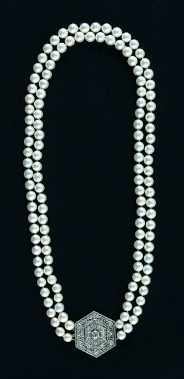 Appraisal: Pearl and diamond necklace knotted double strand of pinkish-white cultured