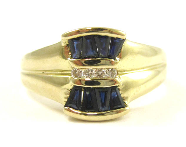 Appraisal: SAPPHIRE DIAMOND AND FOURTEEN KARAT GOLD RING set with eight