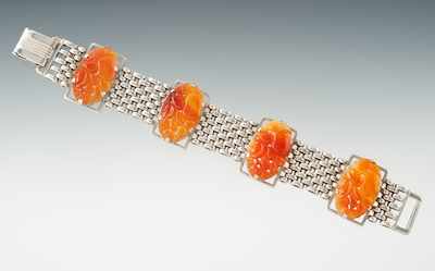 Appraisal: An Art Deco Sterling Silver and Carved Carnelian Bracelet Sterling