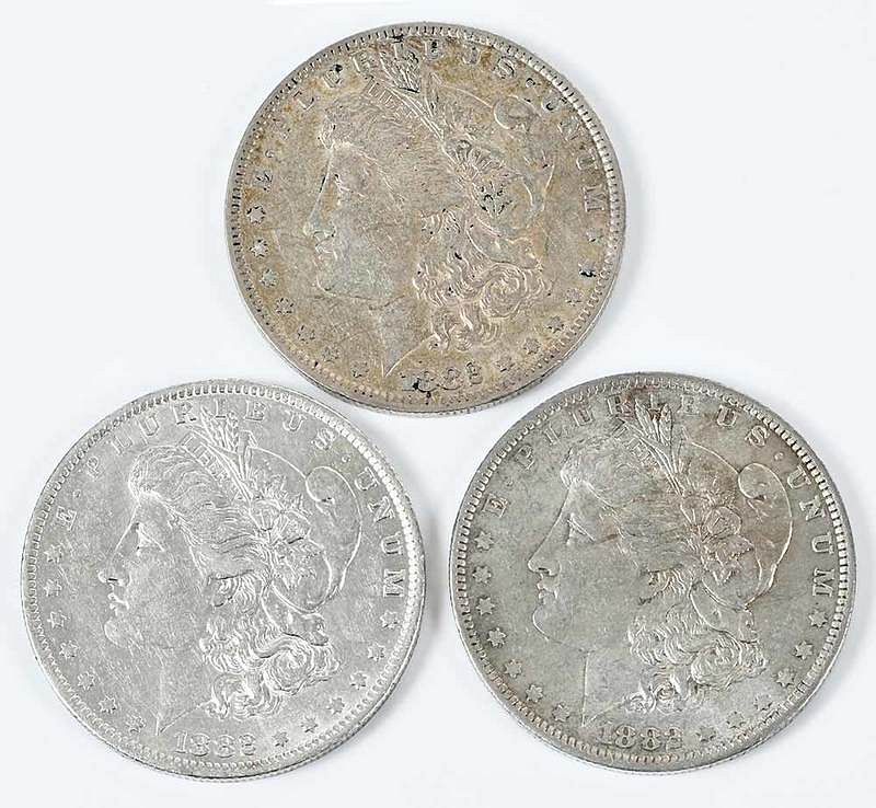 Appraisal: Trio of -O S Morgan Dollars overmintmark variety one recessed