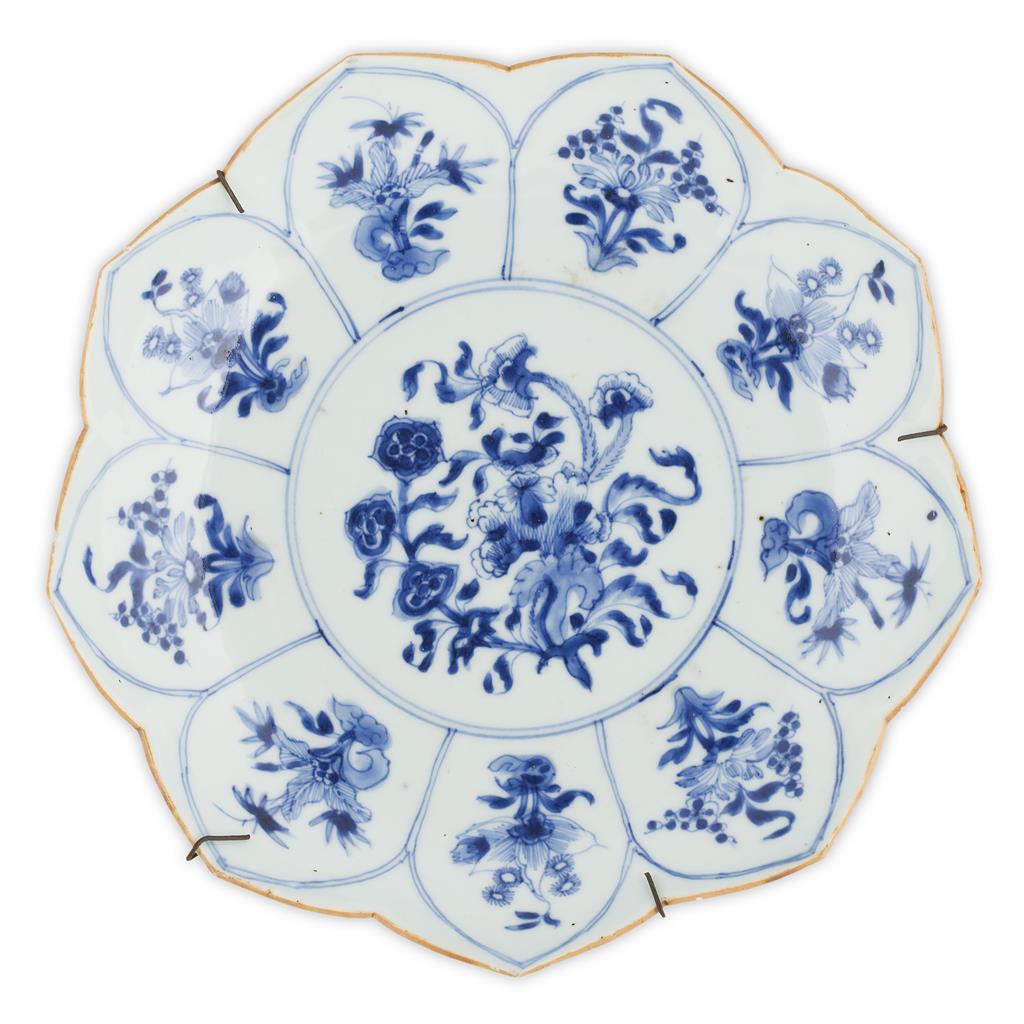 Appraisal: NEAR PAIR OF EXPORT BLUE AND WHITE LOTUS FORM DISHES