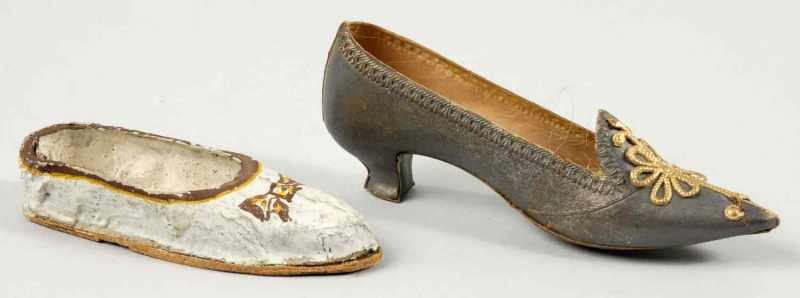 Appraisal: Lot of German Dresden Christmas Ornaments Description Includes one slipper