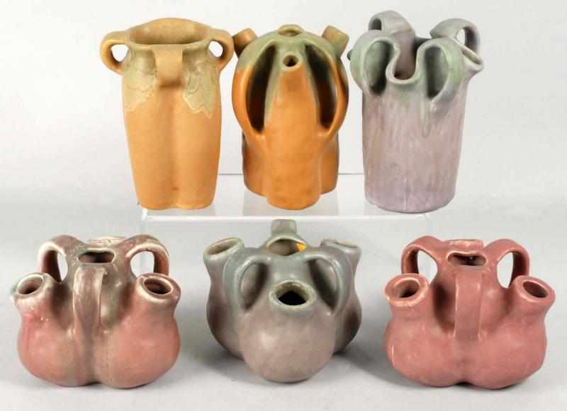 Appraisal: Lot of Muncie Pottery Handled Vases Description Includes five in