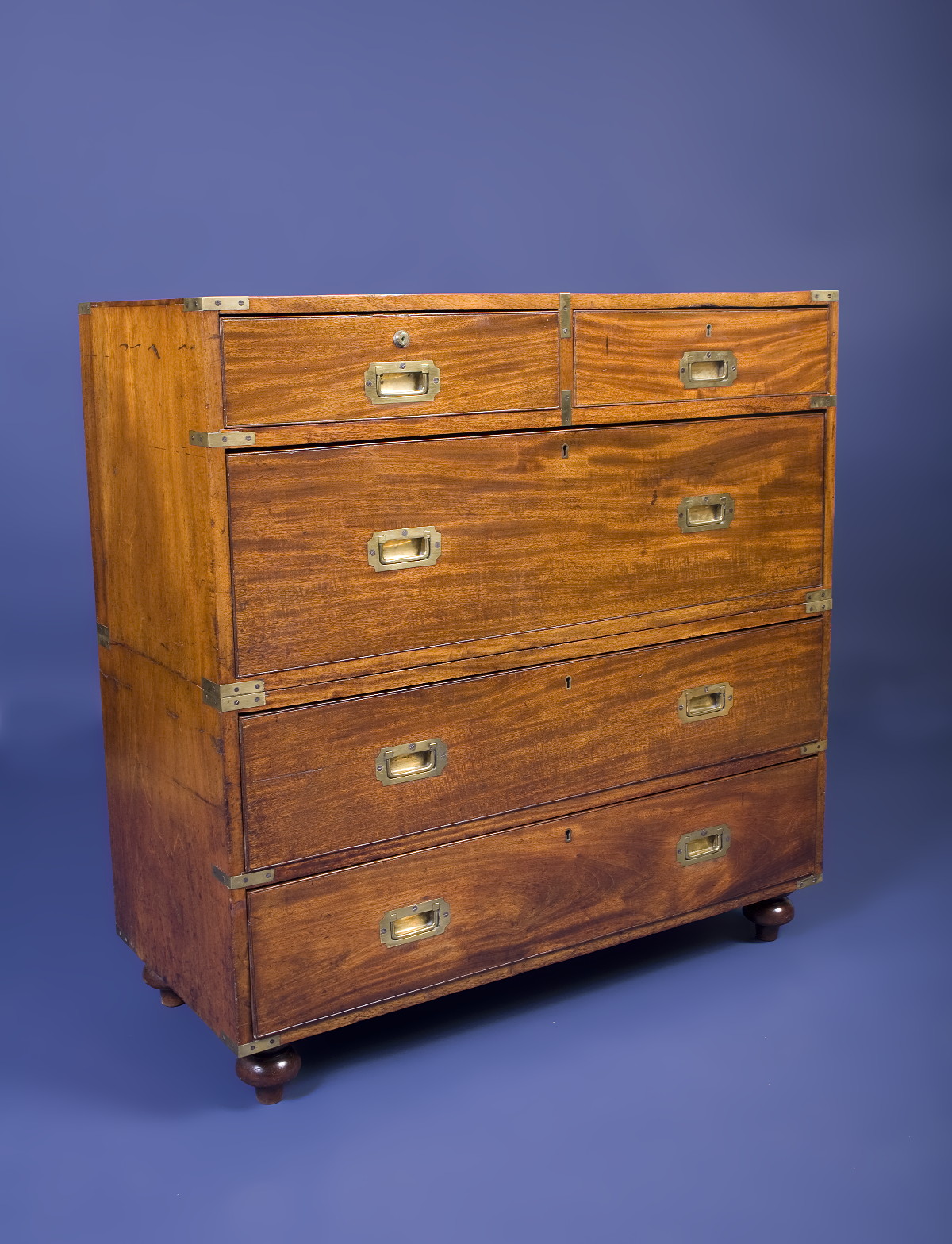 Appraisal: ANGLO-INDIAN CAMPHORWOOD CAMPAIGN CHEST OF DRAWERS In two parts the