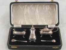 Appraisal: A boxed silver three piece cruet hallmarked for Birmingham