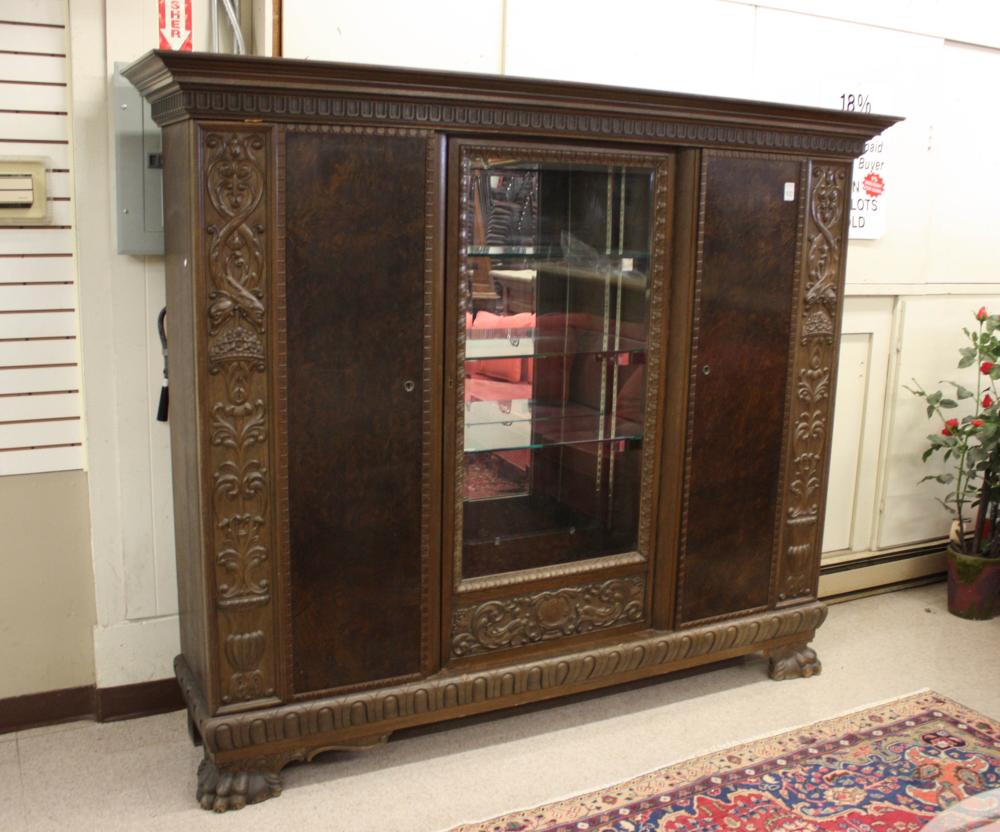 Appraisal: LARGE OAK CABINET BOOKCASE German c glass-panel door between two