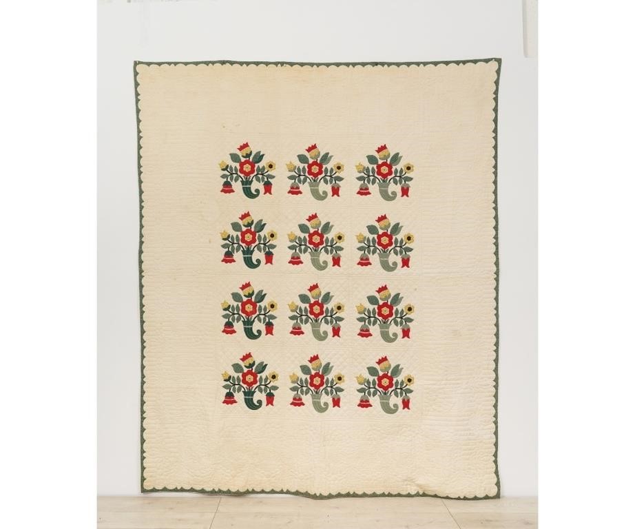 Appraisal: Applique quilt with colorful cornicopias of red tulips and roses