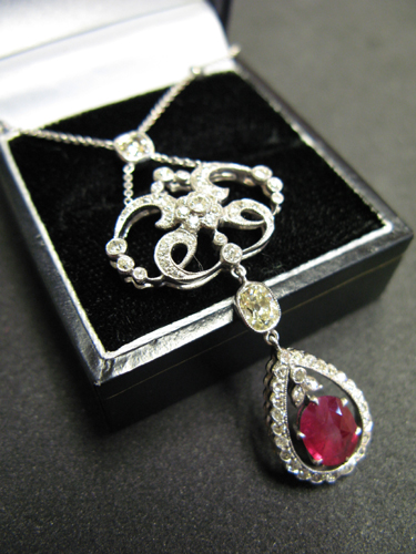 Appraisal: RUBY DIAMOND AND EIGHTEEN KARAT WHITE GOLD PENDANT NECKLACE the