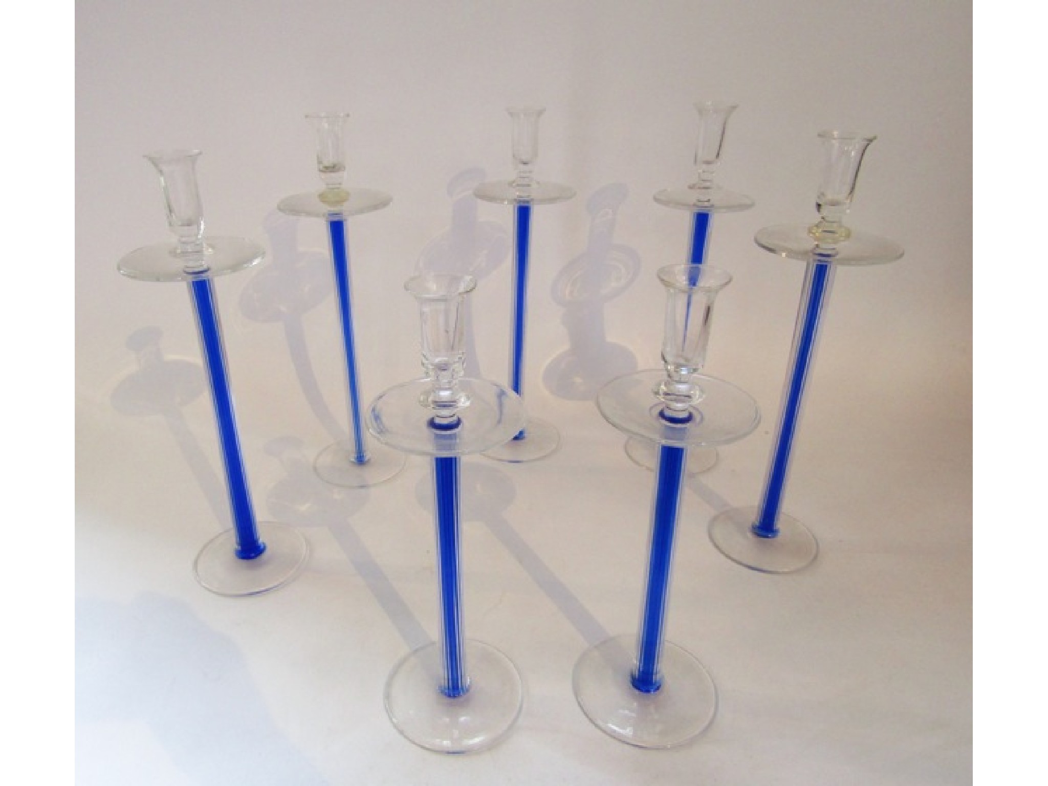 Appraisal: Five th century contemporary glass candle stands each with clear