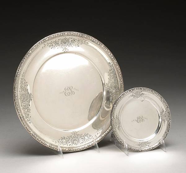 Appraisal: A sterling set of six place plates and twelve bread