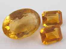 Appraisal: Three loose polished citrines approx carats total