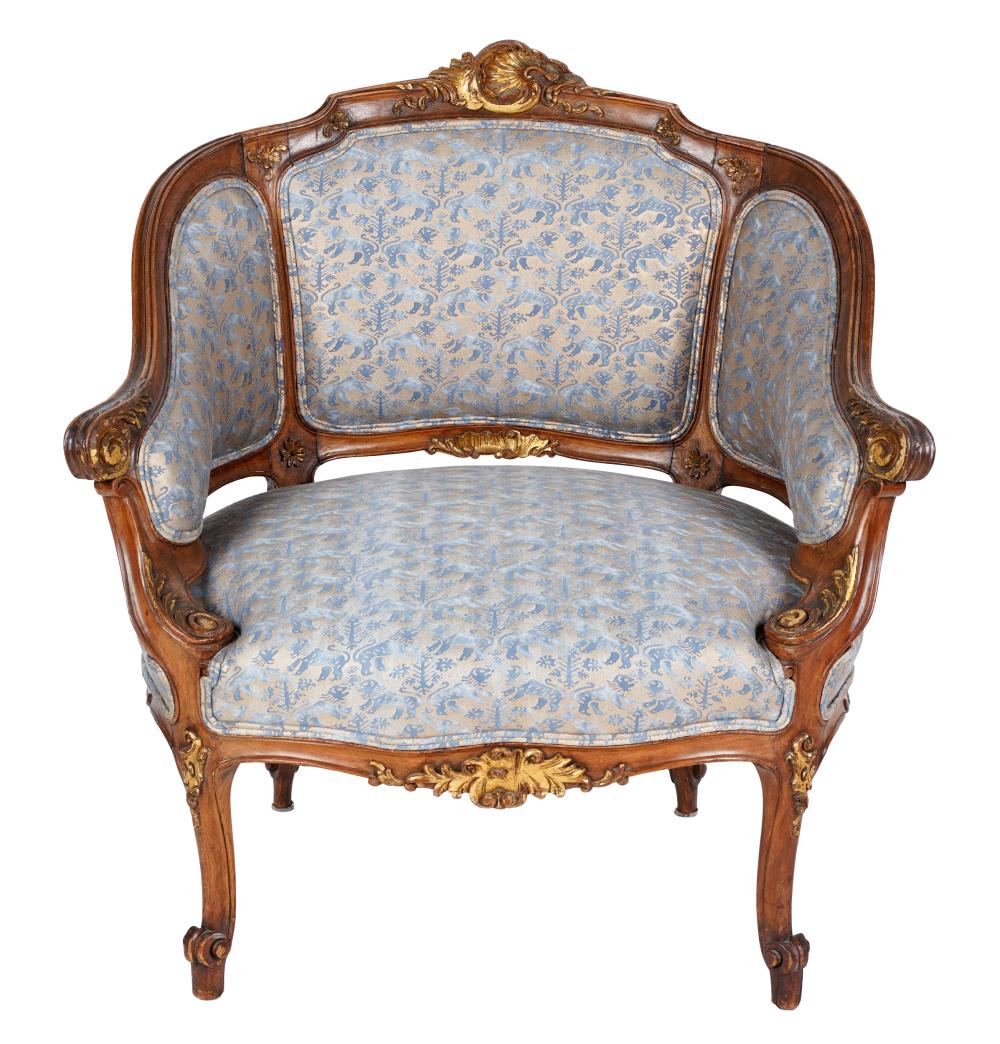 Appraisal: LOUIS XV STYLE CARVED WALNUT BERGEREwith gilt accents the backrest