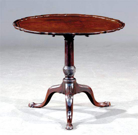 Appraisal: Georgian carved mahogany tilt-top table early th century dished piecrust