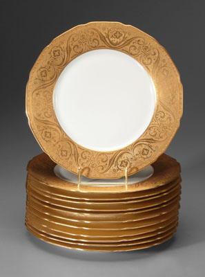 Appraisal: Set of Limoges plates broad gilt floral and scroll borders