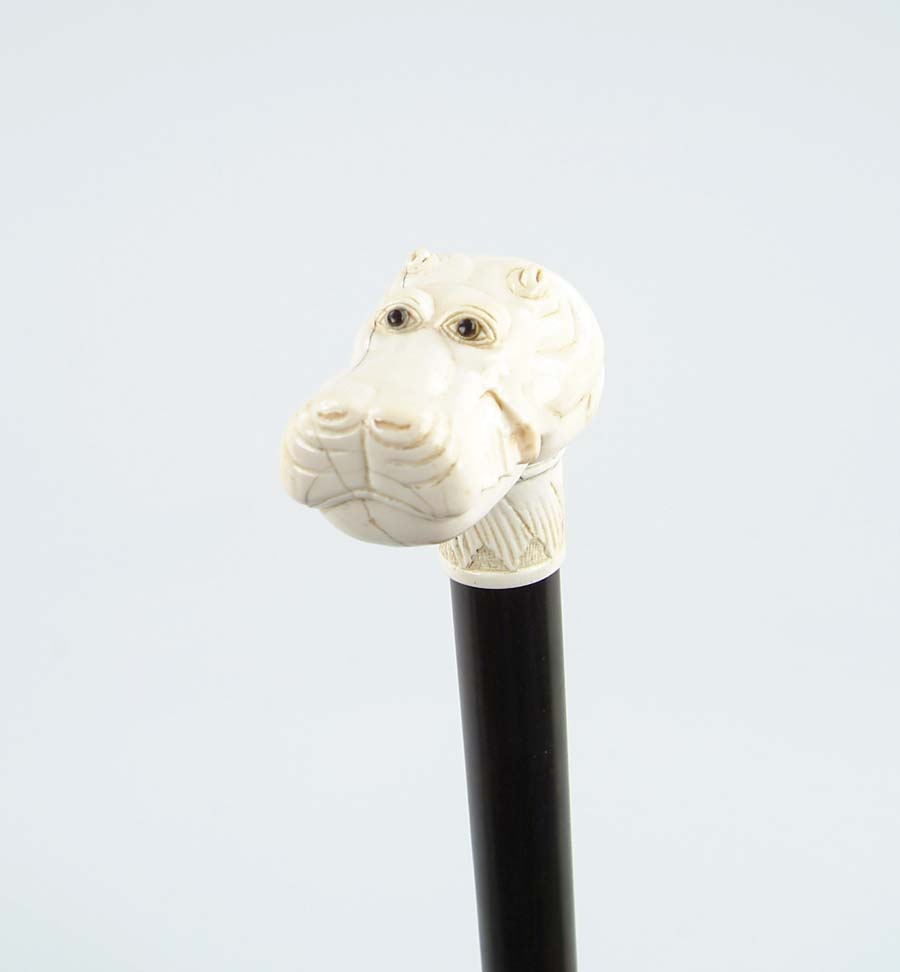 Appraisal: CANE FINE CARVED IVORY HIPPOPOTAMUS AND ROSEWOOD CANE Large L-shaped