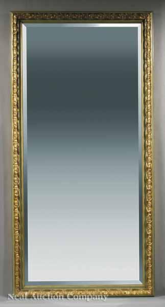 Appraisal: A Pair of Decorative Carved Painted and Gilded Mirrors each