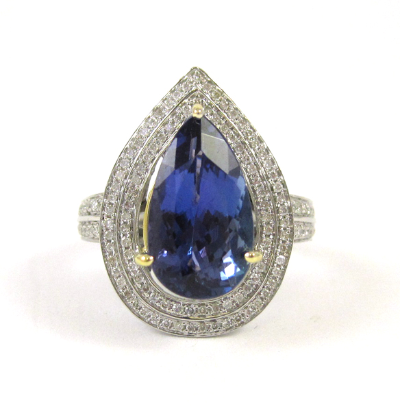 Appraisal: TANZANITE DIAMOND AND FOURTEEN KARAT GOLD RING The white and