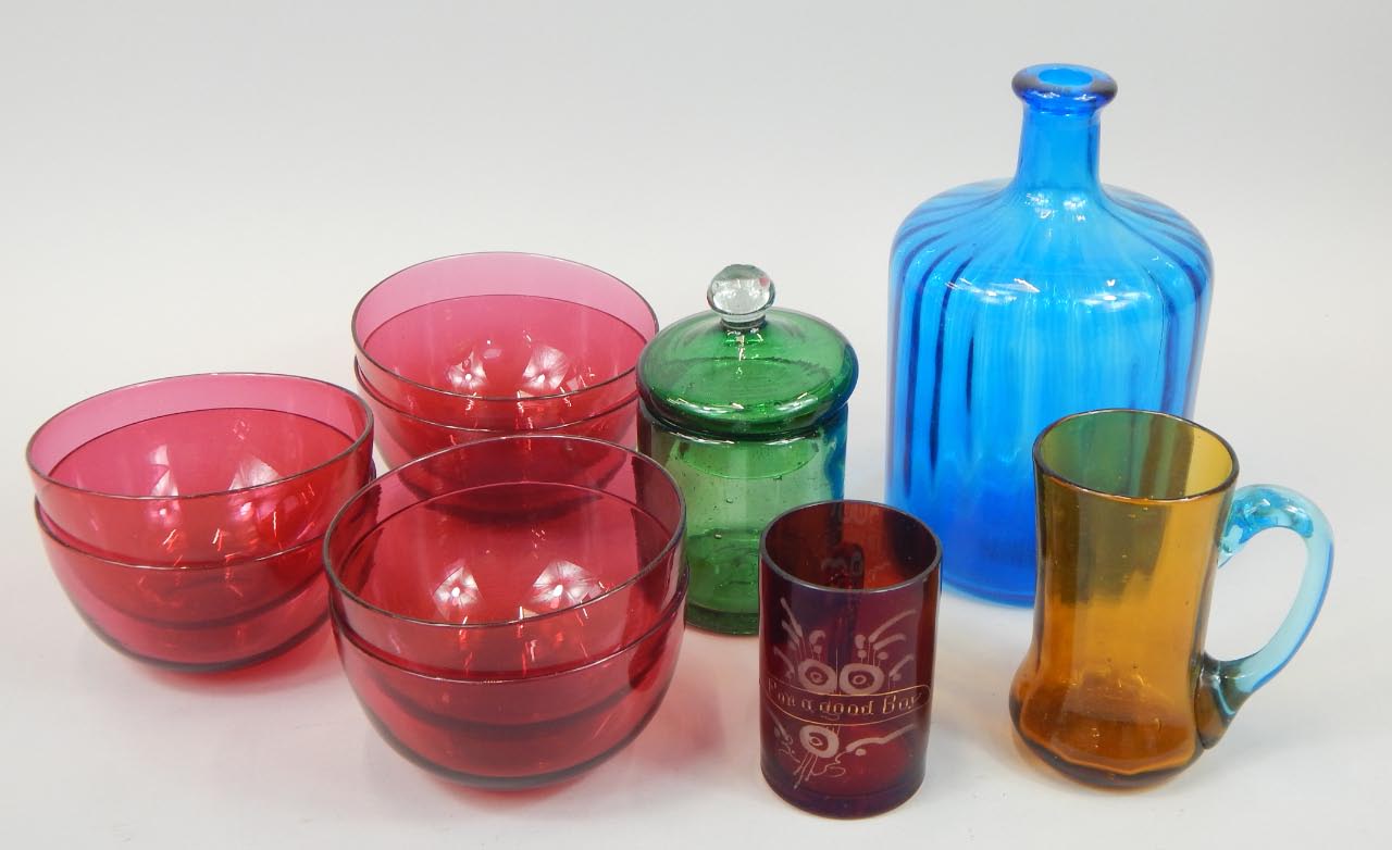 Appraisal: A collection of coloured glass to include six cranberry tinted