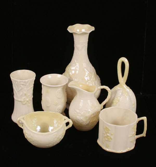 Appraisal: Belleek porcelain glazed pieces all cream with yellow embossed details