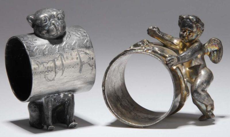 Appraisal: Lot of Figural Napkin Rings Description First is a dog