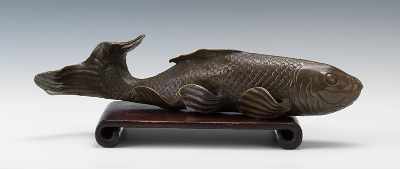 Appraisal: A Bronze Figure of a Carp Graceful cast bronze carp