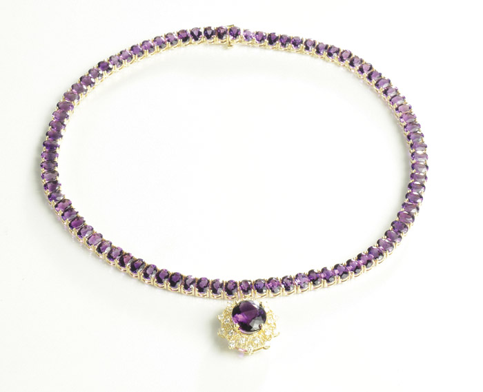 Appraisal: AMETHYST DIAMOND AND FOURTEEN KARAT GOLD NECKLACE The yellow gold