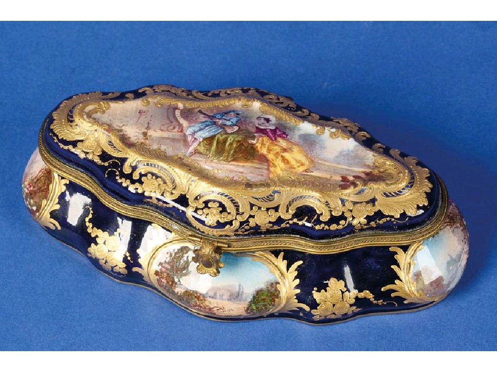 Appraisal: A SEVRES STYLE OVAL-SHAPED BOX AND COVER the bleu-de-roi ground