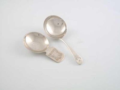 Appraisal: Two caddy spoons a George III Old English pattern example