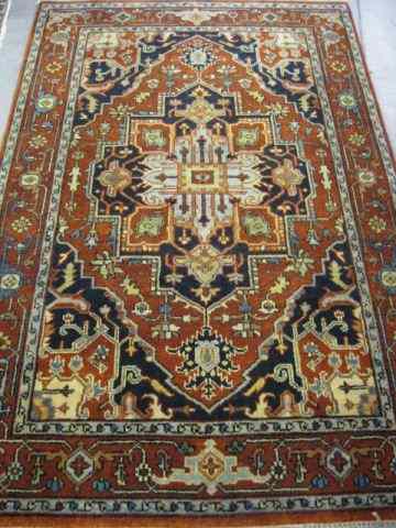 Appraisal: Heriz Persian Handmade Rug central medallion stylized florals salmon field