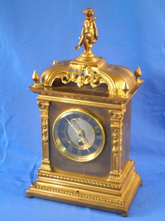 Appraisal: A French gilt metal mantel clock the top cast with