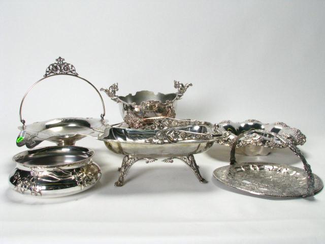 Appraisal: Large group of ornate silverplate including '' grape and vine