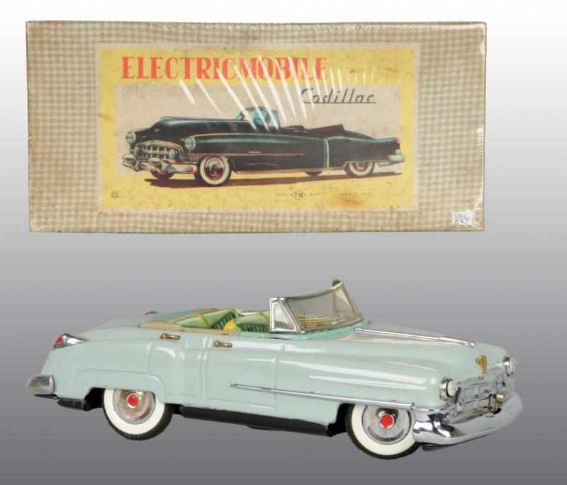 Appraisal: Tin Electricmobile Cadillac Battery-Op Toy Description Japanese Circa Working Made