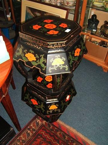 Appraisal: A pair of black lacquered Oriental stools decorated with orange