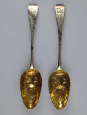 Appraisal: A pair of Georgian silver tablespoons the bowls later berried