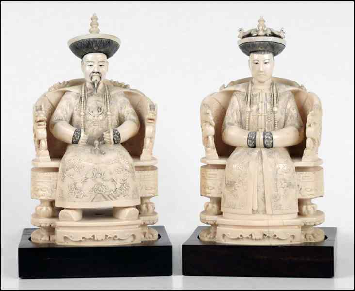 Appraisal: PAIR OF CHINESE CARVED IVORY IMPERIAL FIGURES Provenance Arthur Rubloff