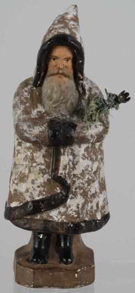 Appraisal: Chalkware Belsnickel Santa Description Brown coat with speckled white paint