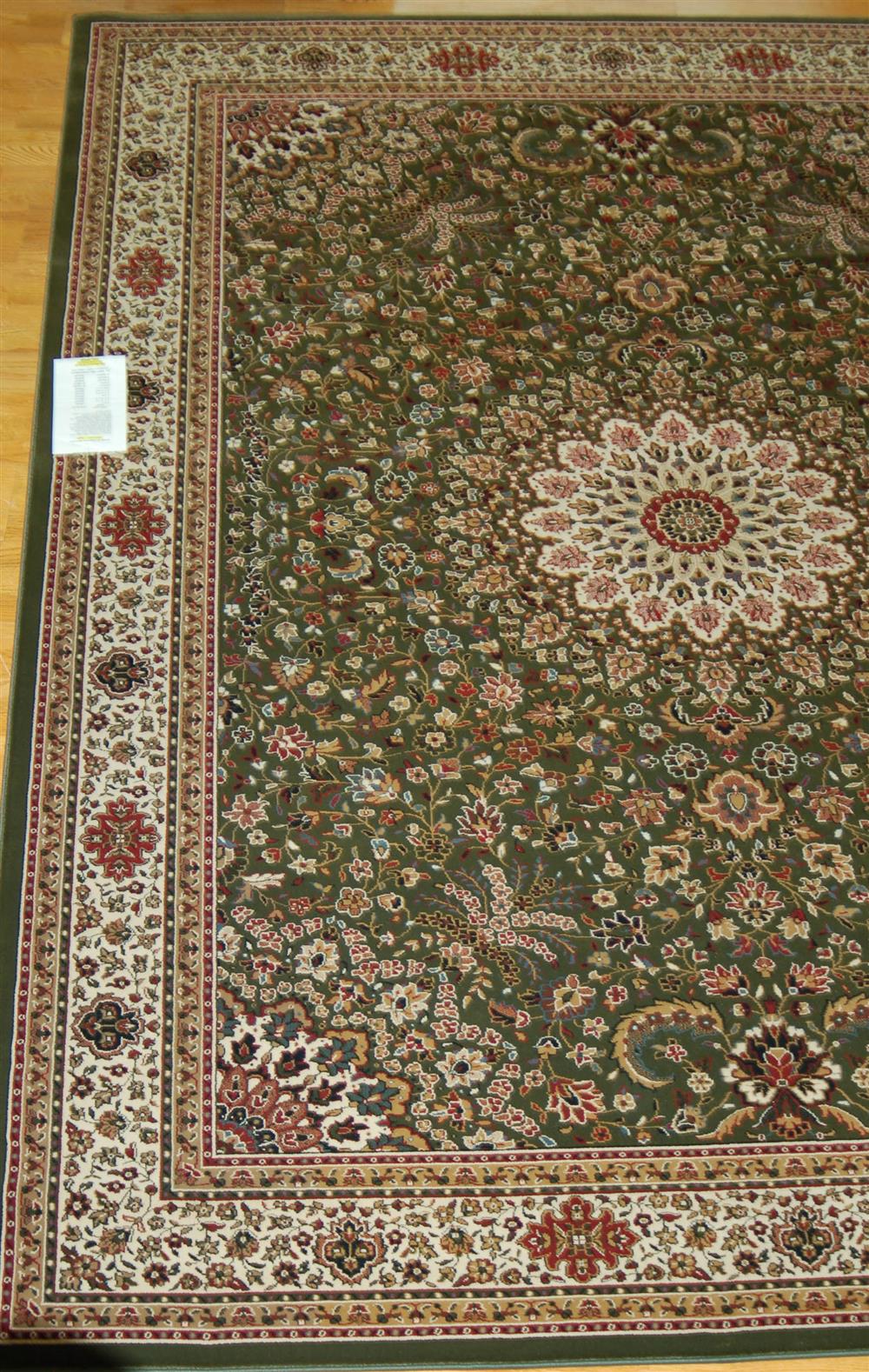 Appraisal: SPHINX ARIANNA RUG center medium brown with ivory rust and