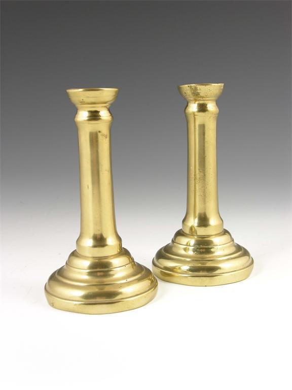 Appraisal: A pair of th century North European brass candlesticks