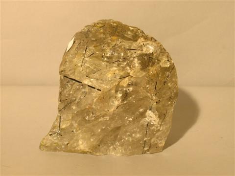 Appraisal: LARGE RUTILATED QUARTZ CRYSTAL Together with a group of sea