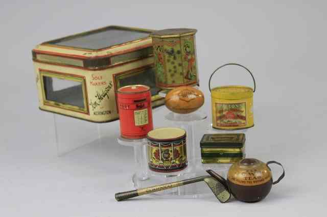 Appraisal: EIGHT MINIATURE NOVELTY TINS Lithographed tinplate comprising an E S