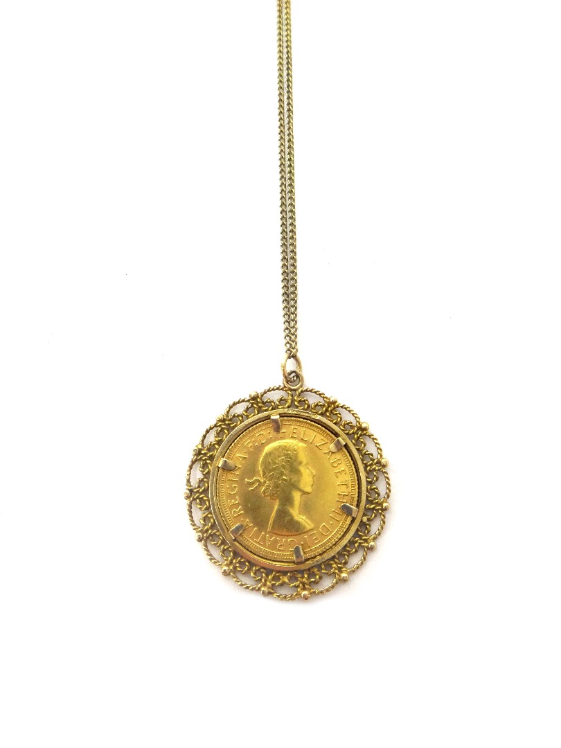 Appraisal: An Elizabeth II sovereign in a gold pendant mount with