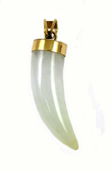 Appraisal: JADE AND FOURTEEN KARAT GOLD PENDANT with a light green