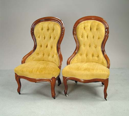 Appraisal: PAIR OF VICTORIAN WALNUT UPHOLSTERED LADY S CHAIRS Finger carved