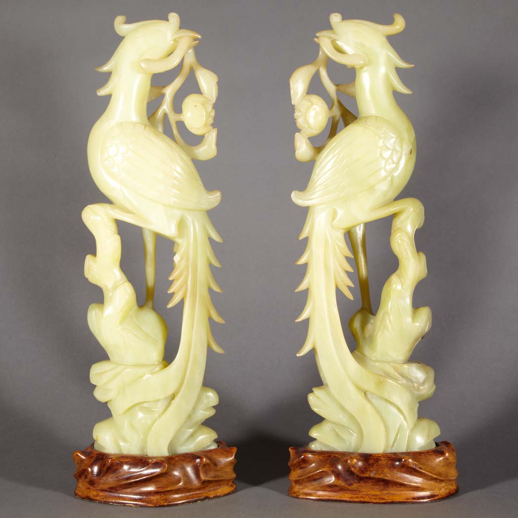 Appraisal: Pair of Chinese Celadon Jade Birds Each carved in mirror