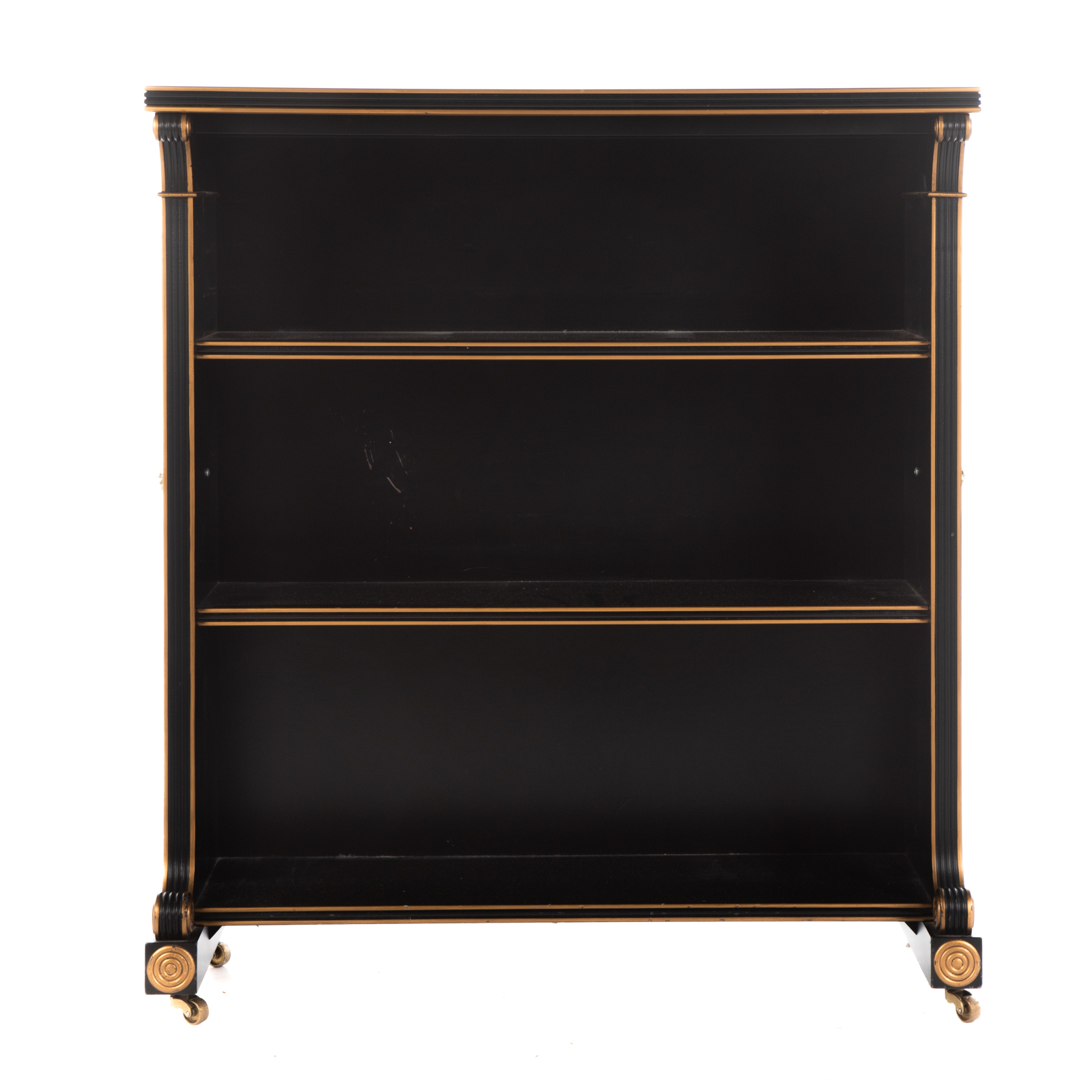 Appraisal: EBONIZED THREE-TIER LOW BOOKCASE th century with reeded edge and