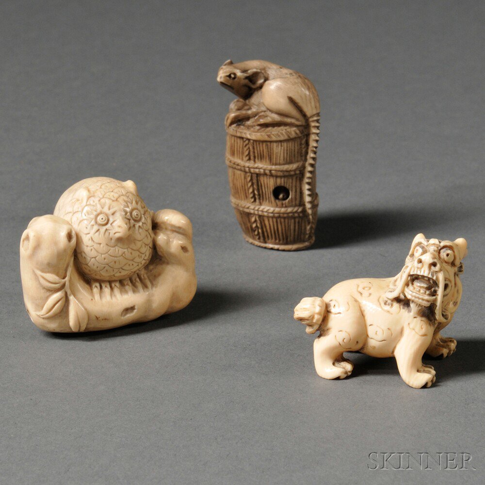 Appraisal: Three Ivory Netsukes Japan th century an owl a lion