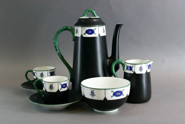 Appraisal: A Royal Worcester bachelor coffee service comprising two cups and