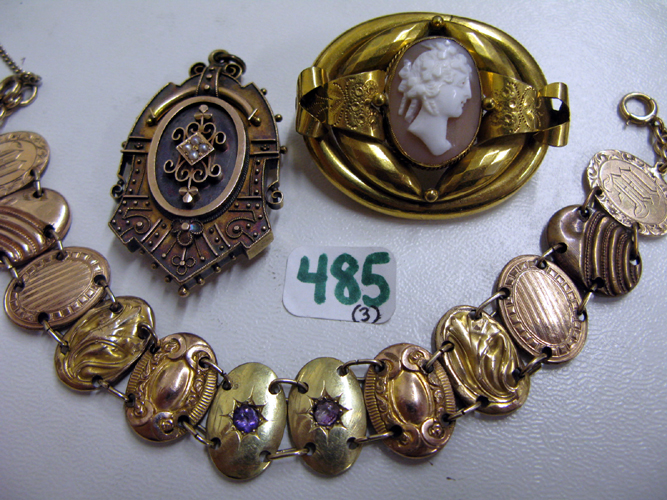 Appraisal: THREE ARTICLES OF TEN KART GOLD JEWELRY including a cameo